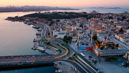 Istanbul Spice Market, Yeni Cami, Galata Bridge, Emin&ouml;n&uuml; District at Old city in Early morning. Hagia Sophia and Topkapi Palace seen in background. Static drone shot. Istanbul, Turkey