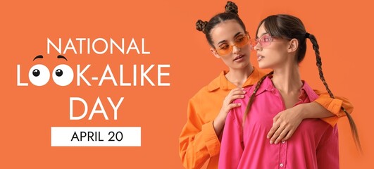 Beautiful young fashionable sisters on orange background. Banner for National Look-Alike Day