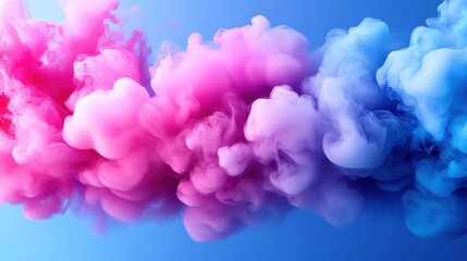 Fototapeta premium Vibrant pink and blue ink swirling in studio