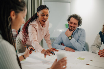 Diverse team collaborating on creative project