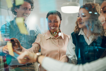 Diverse team collaborating on creative project