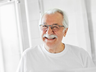 man bathroom care senior hair hygiene morning skin elderly beauty portrait hairbrush hairstyle skincare cheerful  male adult caucasian face cosmetic