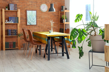 Interior of coffee shop with table and bookshelves