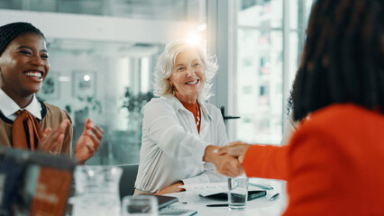 Applause, handshake and meeting with business women in office for workshop, success and celebration. Welcome, introduction and winner with people shaking hands in seminar for agreement, bonus or deal