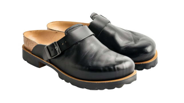 Pair of black leather clogs with buckles on transparent background