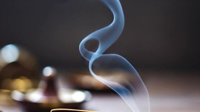 Single strand of swirling smoke, representing abstract form and ephemerality