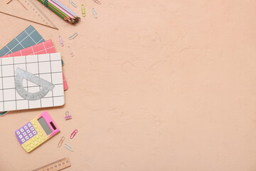 Different stationery on beige background. Top view