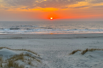 Landscape shot of beautiful sunset in the Dunes of Hvide Sand Denmark