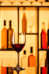 Glass with red wine in bar