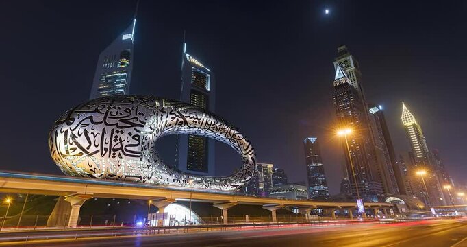 Dubai City Skyscrapers & Museum of Future Exhibition. Night View of Dubai Skyline, Road. Beautiful Night Timelapse Of Dubai, United Arab Emirates