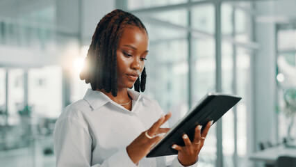 Scroll, black woman and tablet in office for business, email and reading news on economy. Digital technology, serious and financial advisor on app for investment review, profit and schedule online