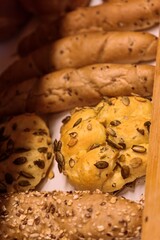 Assorted Fresh Whole Grain and Seeded Bread in Bakery Display
