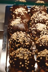 Chocolate Glazed Profiteroles with Crunchy Nuts