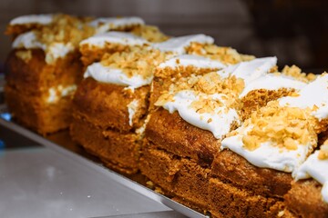 Freshly Baked Carrot Cake Loaves with Cream Cheese Frosting and Walnuts