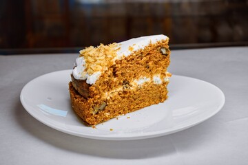 Homemade Carrot Cake Slice with Cream Cheese and Walnuts