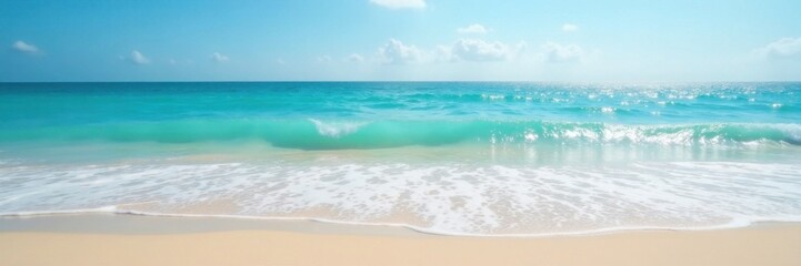 Serene beach scene with soft blue ocean waves gently lapping at the shore, sand, sunset
