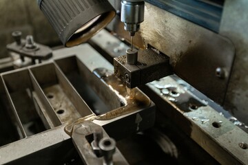 electrical discharge machining of metal, industrial metal processing