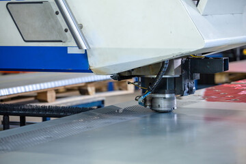 sheet metal cutting shop, industrial metal processing, close-up