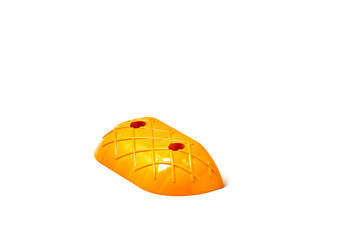 Bright Orange Plastic Item Designed with Pineapple Shape and Texture, Perfect for Use in Various Creative Projects and Playful Activities