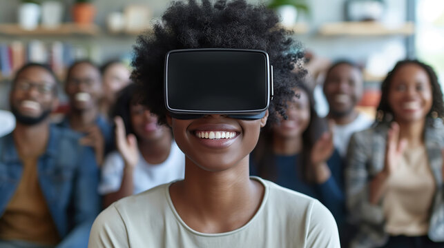 Diverse group of coworkers cheering for colleague wearing VR headset, symbolizing teamwork, innovation, and immersive technology in a corporate environment.