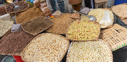 Top view of ingredients used to prepare fanesca dish sold at a market. Various grains, legumes, vegetables. Traditional Ecuadorian food eaten during Holy Week and Easter