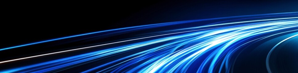 Fototapeta premium Abstract blue, glowing light speed lines in curved motion on a black background