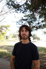 Long Hair Man Astonished To Read An Incomprehensible Poster On The Street