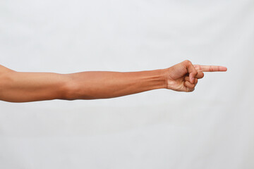 Dark Skin Hand Pointing Right Against Plain Background Simple Minimalist Studio Shot with No