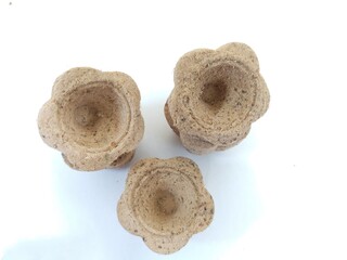 Sambrani is made from selected wood powder.  when burned it will create a very fragrant smell