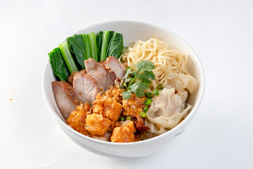 Egg noodle with red roast pork, crispy pork, dumplings, soup and condiments