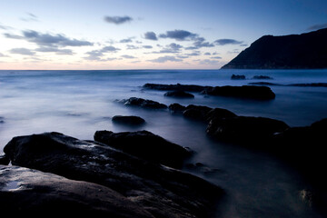 Sunset, view of the cliffs at Porto Ferro, Sassari Alghero. Sardinia, Italy