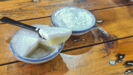 Coconut milk custard in small porcelain cup (Kanom Tuay), Thai dessert