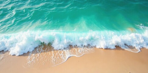 Obraz premium Emerald and turquoise waves merge on sandy beach, peaceful, surf