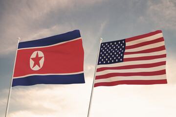 Relations between the countries of the United States of America USA and NORTH KOREA represented by the concept of two flags waving against a cloudy sky.3d render.
