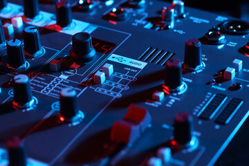 Professional mixing console, closeup. Radio studio equipment