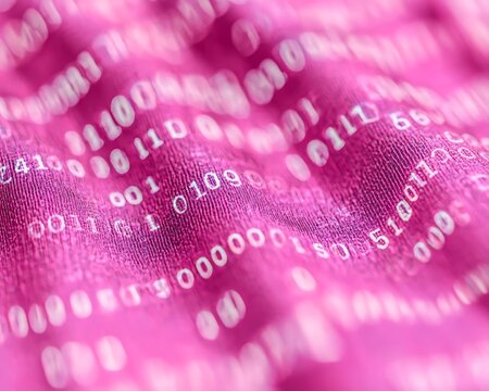 Pink fabric surface displaying binary data and numerical information