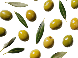 A vibrant collection of green olives and bay leaves scattered on a clean white background, showcasing their natural textures and colors.