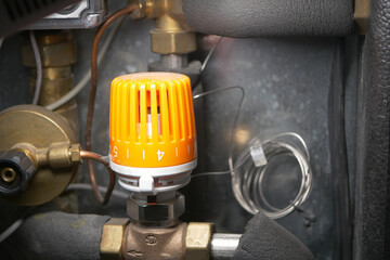Equipment control valve with orange knob located in mechanical room