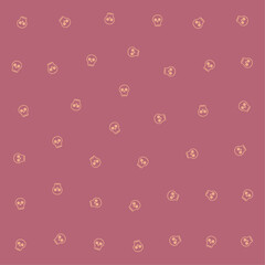a pattern of skulls and faces on a pink background