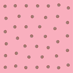 a pink background with a pattern of chocolate donuts