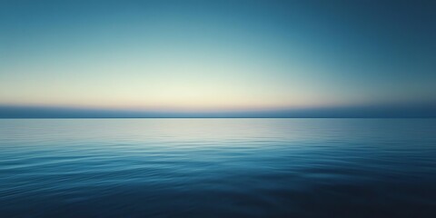 Obraz premium Calm Ocean at Dusk with Gradient Sky and Rippling Water Surface