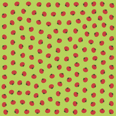 a pattern of red tomatoes on a green background