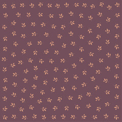 a pattern of leaves on a purple background