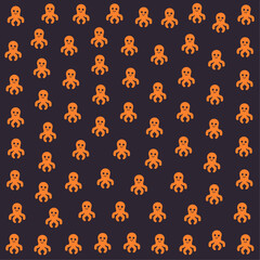a pattern of orange skulls on a black background