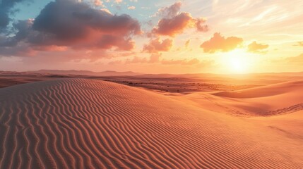 Naklejka premium Serene Sunset Over Golden Sand Dunes Stretching to Distant Horizon