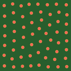 a green background with orange slices on it
