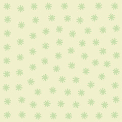 a pattern of snowflakes on a light green background