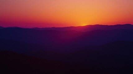 Obraz premium Warm sunset gradient with rich orange blending into magenta and deep violet, creating a cinematic, softly diffused light perfect for atmospheric and dreamy visual backgrounds.