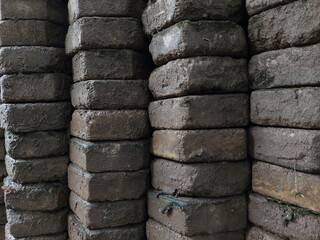 neatly arranged pile of peping stones