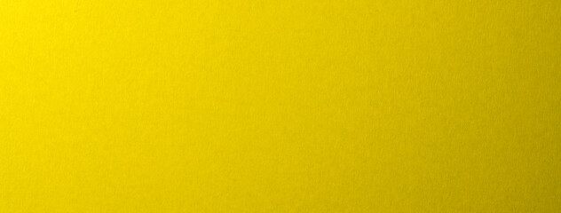 質感のあるレモンイエローの紙の背景テクスチャー